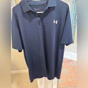 Extra large men’s, navy blue, Under Armour polo. Never worn
